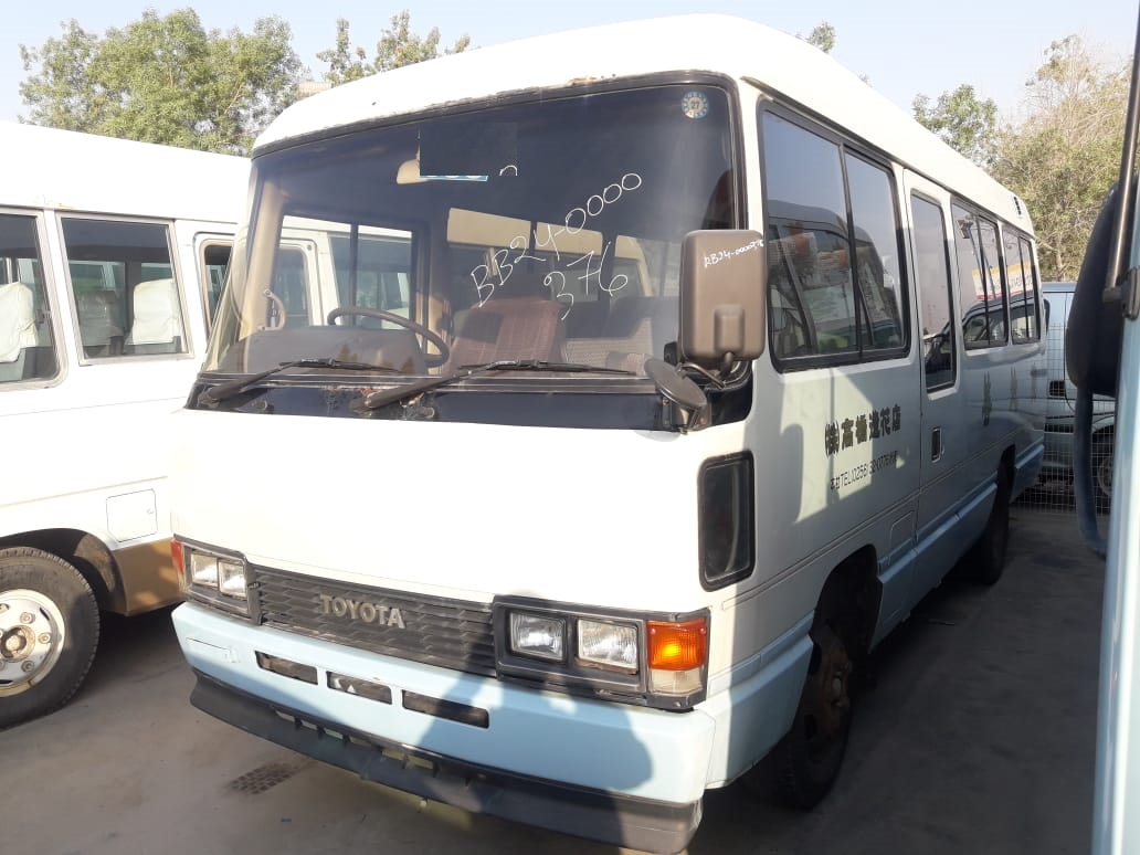 376 - Toyota coaster bus 3.7 MT White & blue